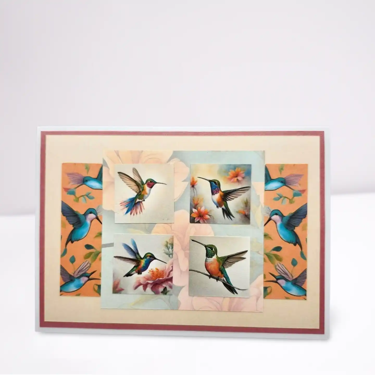 Card with colorful illustrations of hummingbirds and flowers on a white background