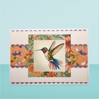Card with a colorful illustration of a hummingbird and flowers on a light blue background
