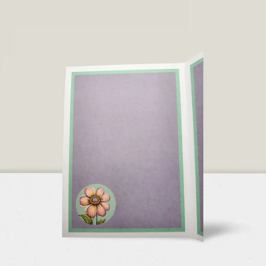 Greeting card with a flower design on a light gray background