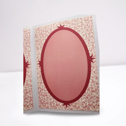 Card with a red balloon design on a floral patterned border