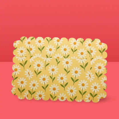 Floral-patterned mat on a red background