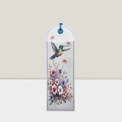 Decorative bookmark with a hummingbird and floral design on a white background