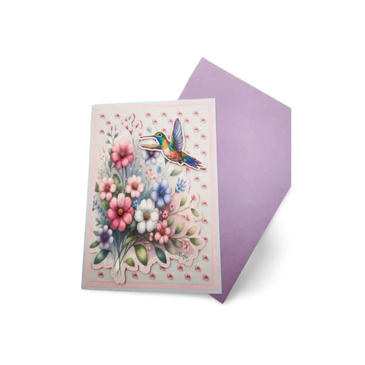 Greeting card with a colorful hummingbird and flowers design on a white background