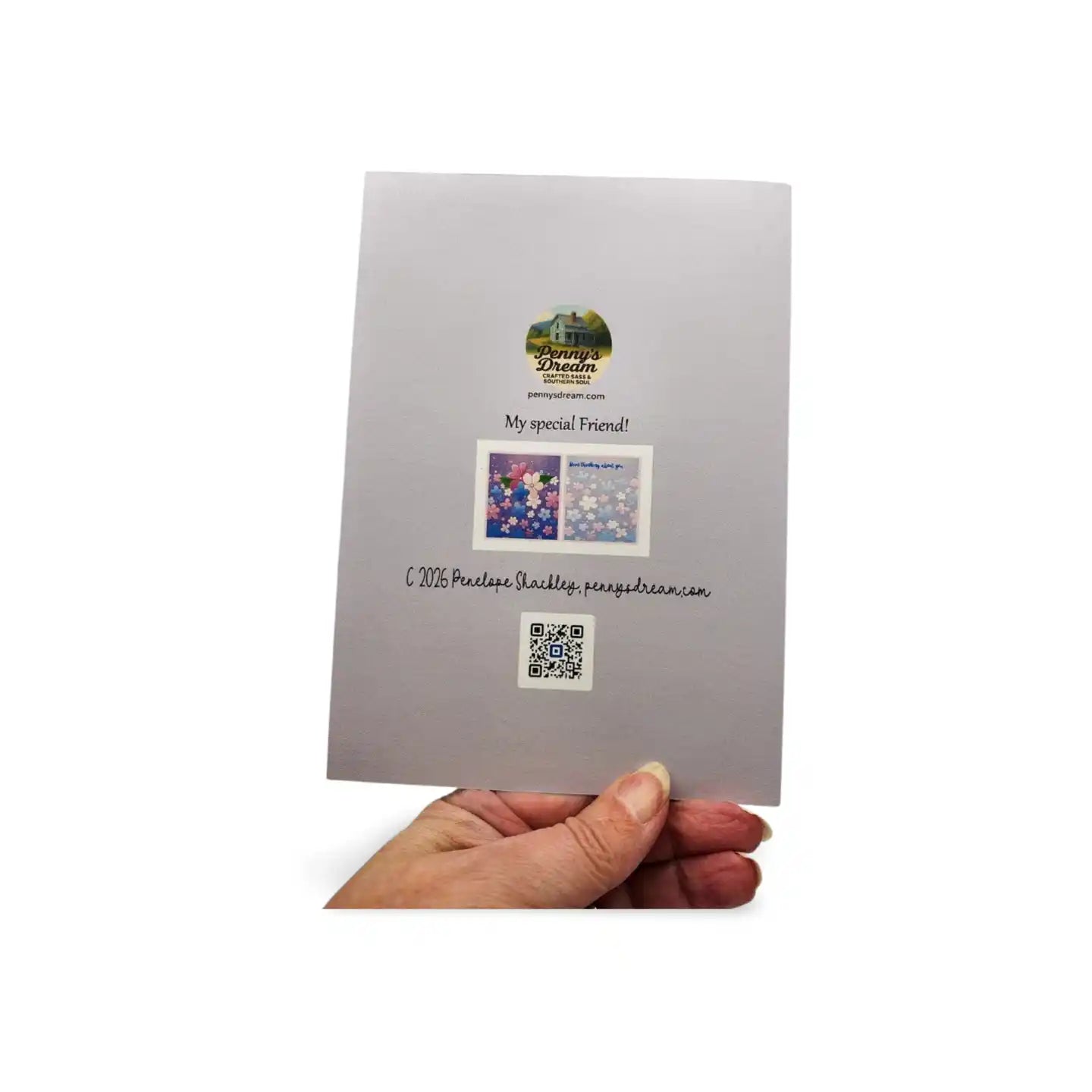 Hand holding a gray card with a QR code and text on a white background