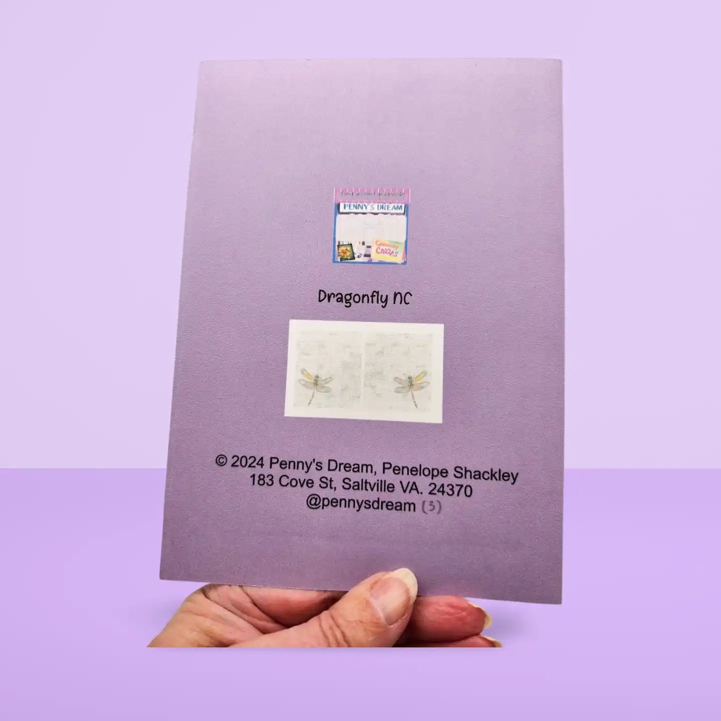 Purple card with text and a small image on a purple background