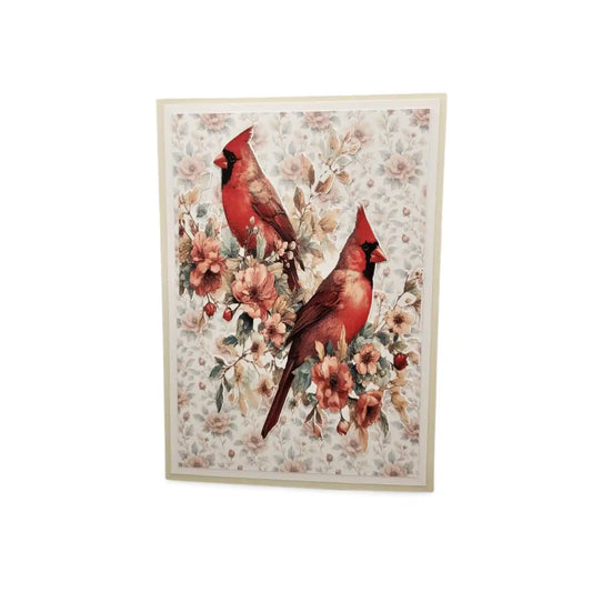 Framed artwork with red cardinals and floral design on a white background