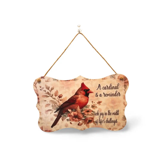 Decorative sign with a cardinal and floral design on a white background