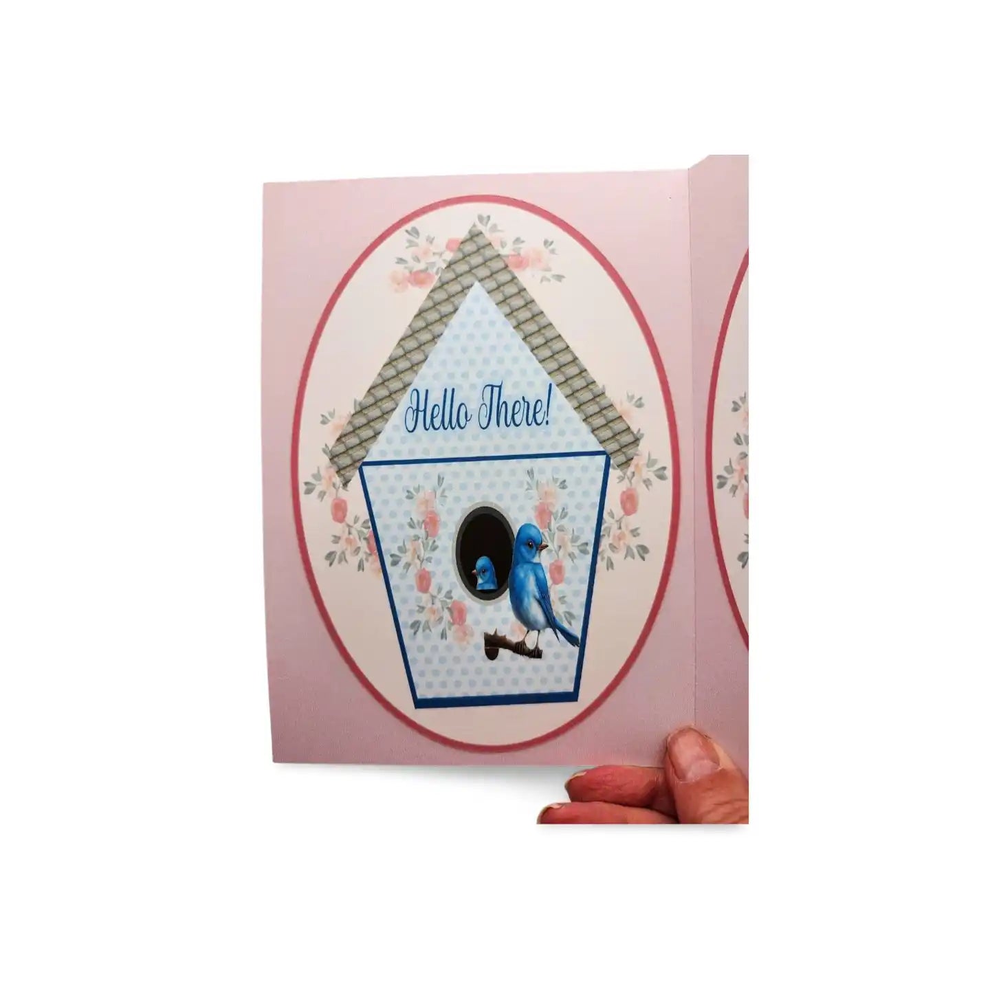 Card with a birdhouse design and 'Hello There!' text on a pink background