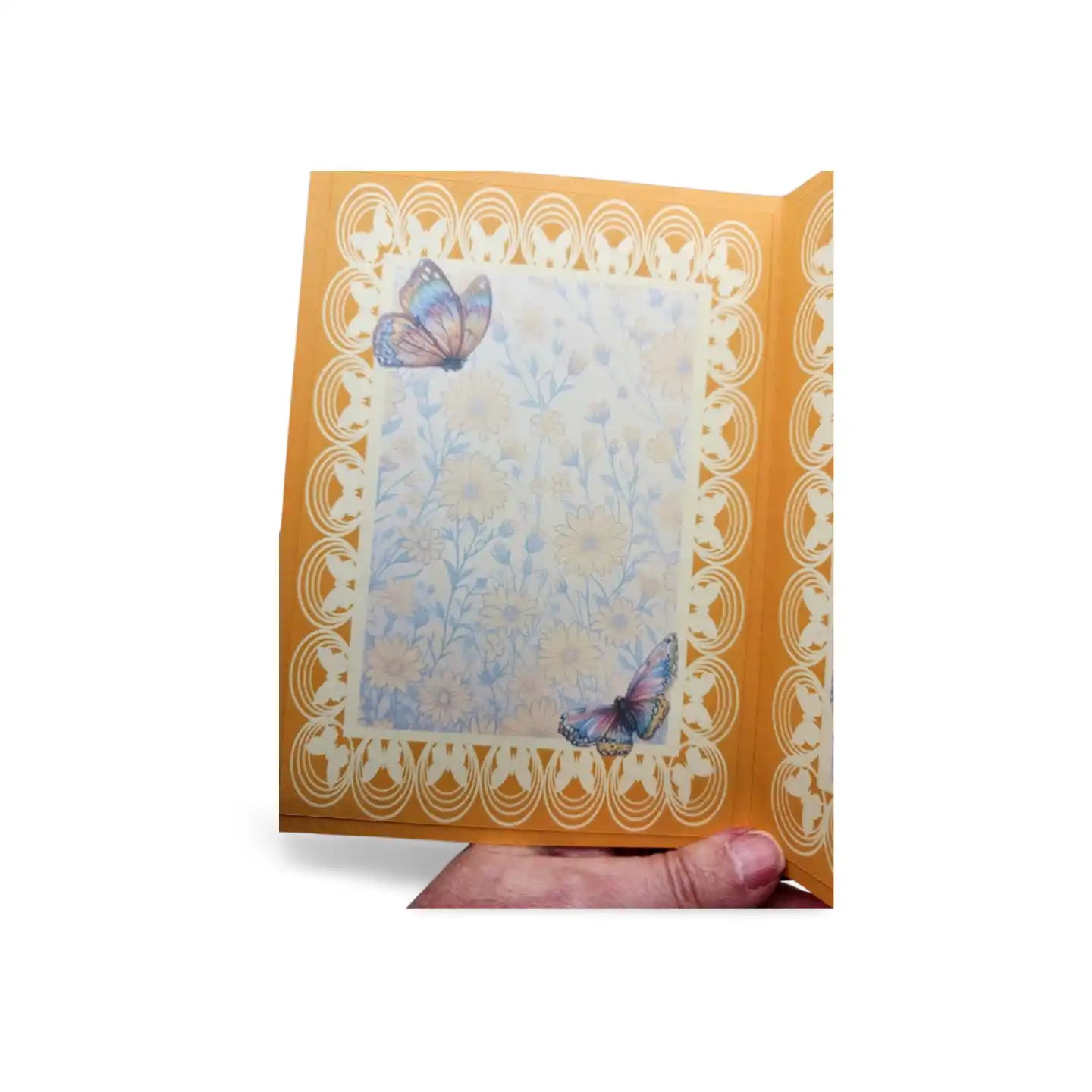 Decorative card with butterflies and floral design on a white background