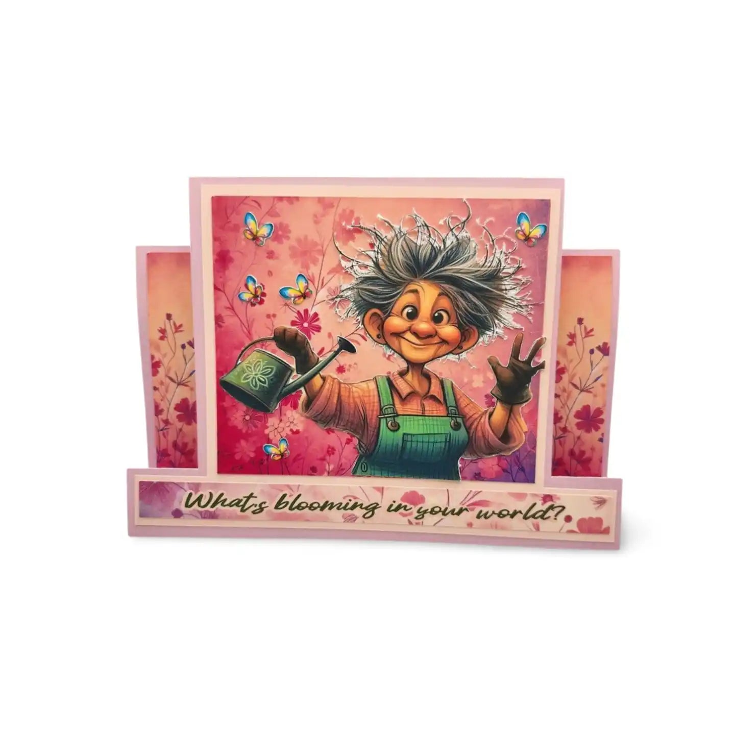 Greeting card with a cartoon character holding a watering can and flowers, with text 'What's blooming in your world?'