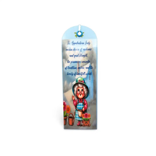 Decorative bookmark with a cartoon character and text on a white background