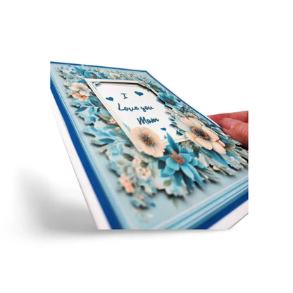 Greeting card with floral design and 'I love you Mom' text on a white background
