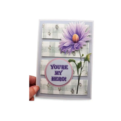 Greeting card with purple flower and 'You're My Hero!' text on a white background