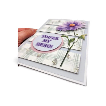 Greeting card with 'You're My Hero!' message and floral design on a white background