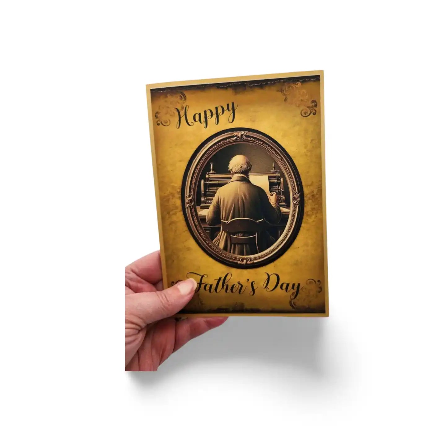 Hand holding a Father's Day card with a vintage-style design.