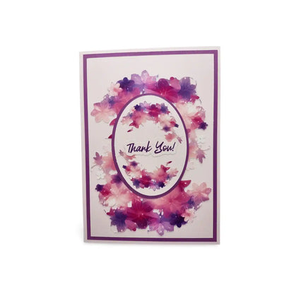 Greeting card with floral design and 'Thank You!' text on a white background