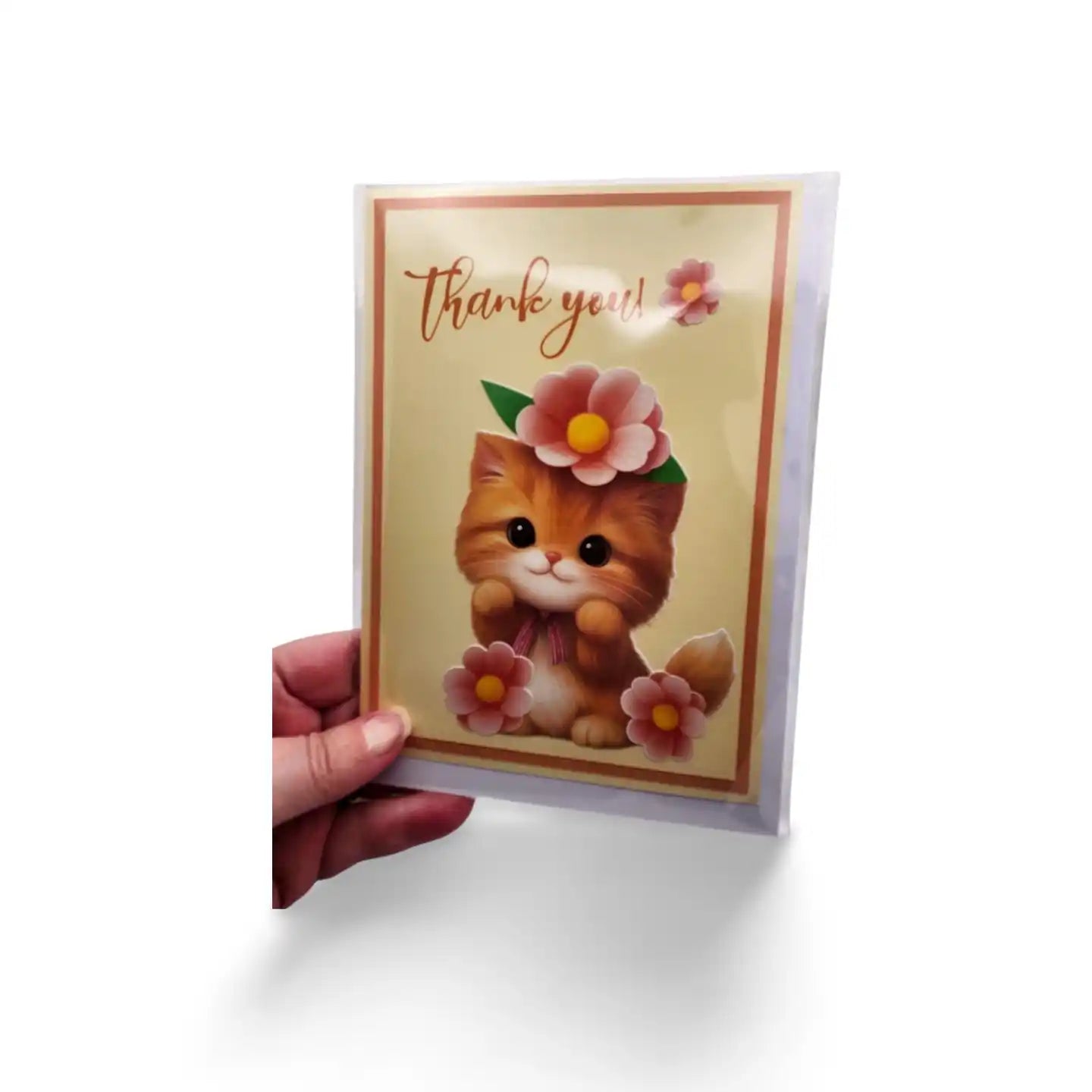 Card with a cat illustration and 'Thank you!' text held by a hand on a white background