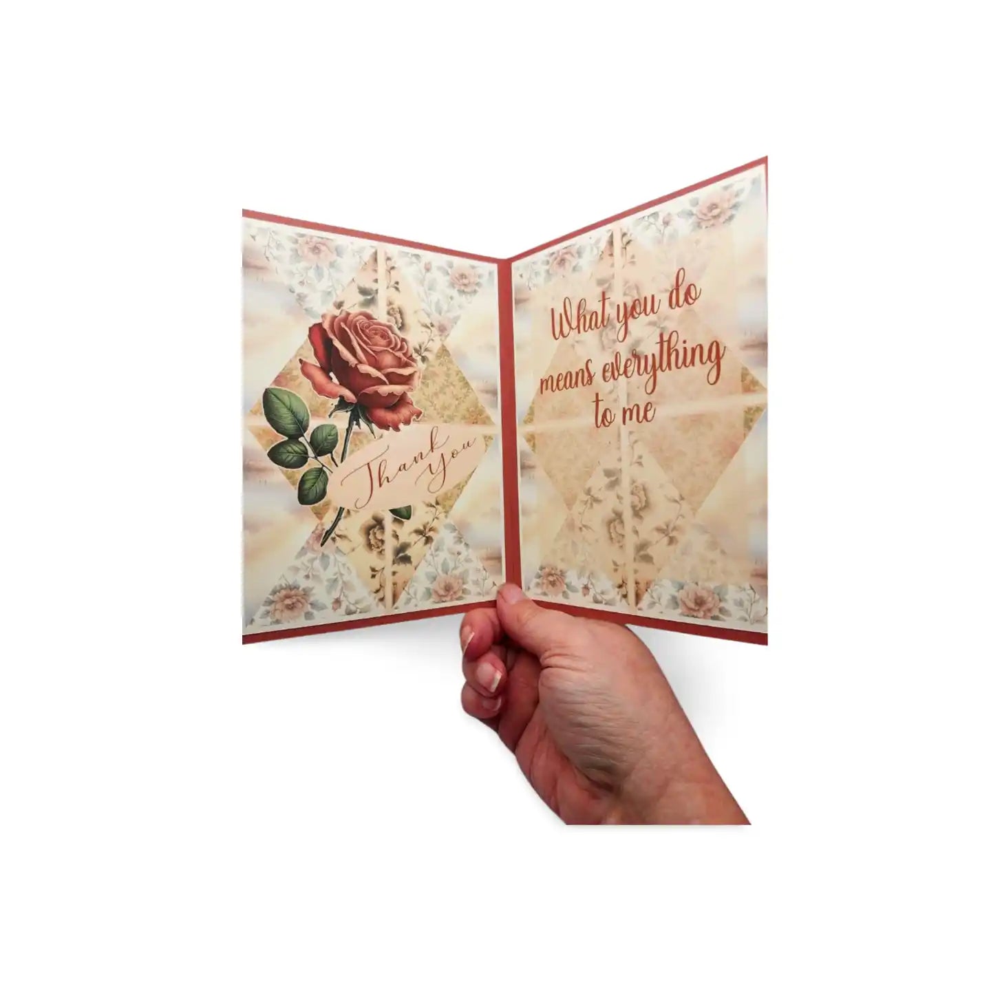 Hand holding a floral card with a rose design and text on a white background