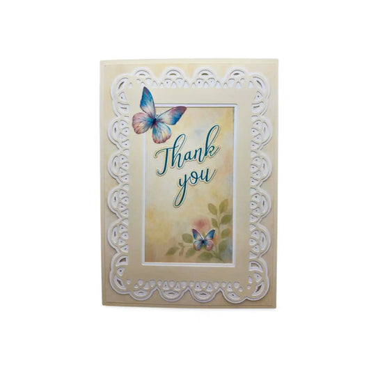 Greeting card with butterflies and 'Thank you' text on a decorative frame.