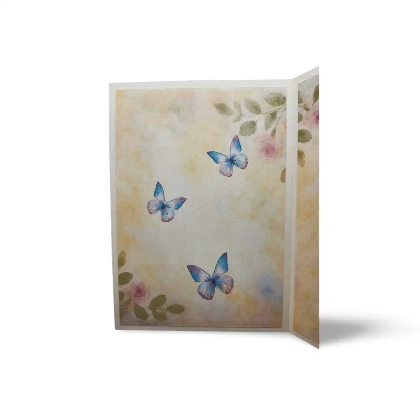 Folded card with butterflies and floral design on a white background