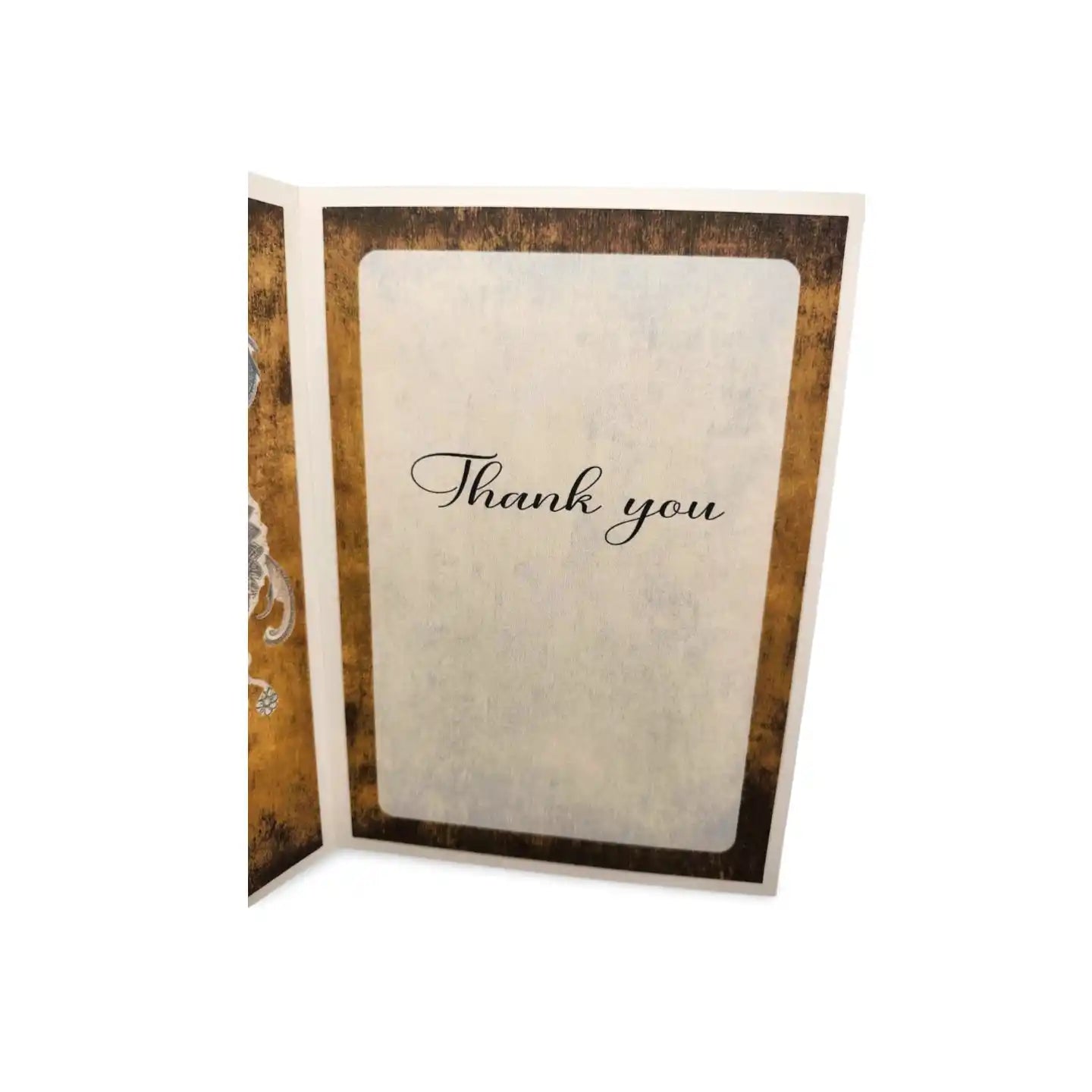 Greeting card with 'Thank you' text on a textured background
