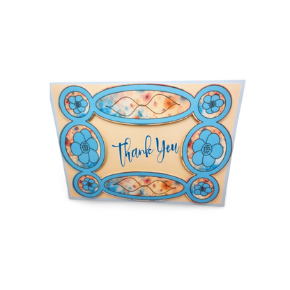 Greeting card with floral design and 'Thank You' text on a white background