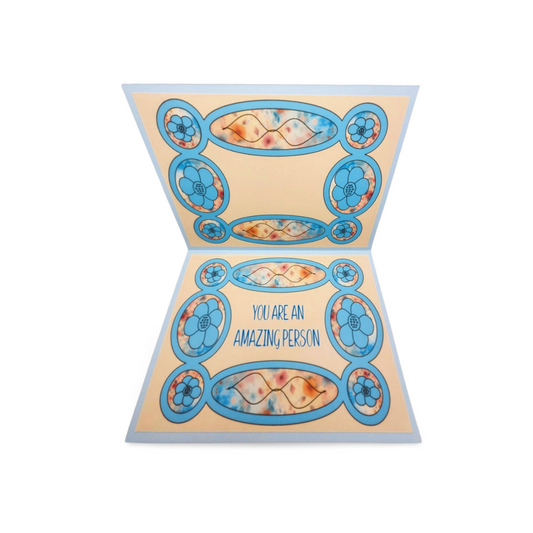 Decorative card with floral patterns and text on a white background