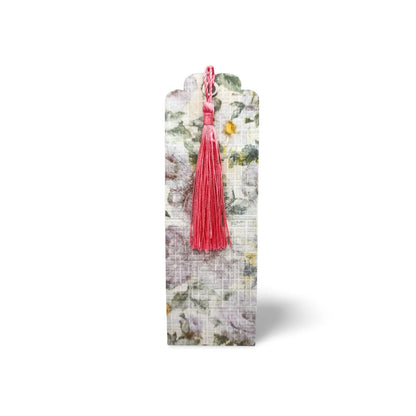 Floral bookmark with a pink tassel on a white background