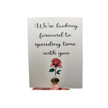 Card with a rose illustration and text on a white background