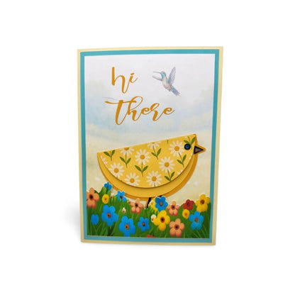Greeting card with a yellow chick and floral design on a white background
