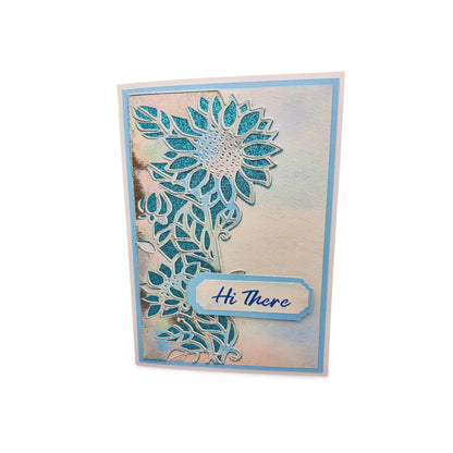 Greeting card with floral design and 'Hi There' text on a white background