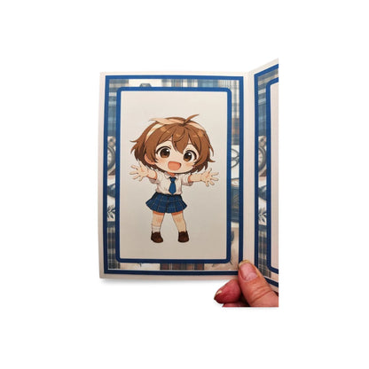 Card with a cute illustration of a character in a school uniform held by a hand on a white background