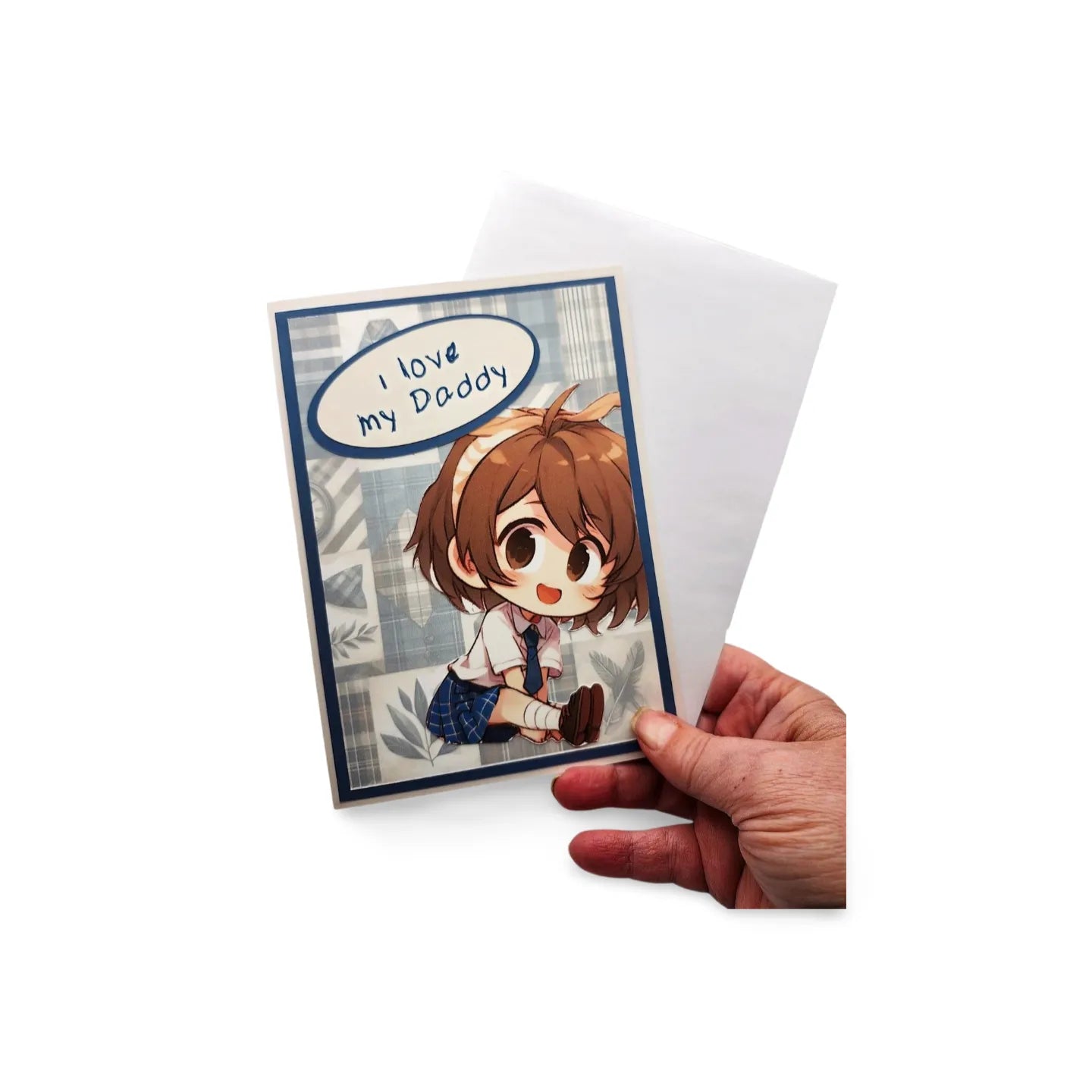 Greeting card with cartoon character and 'I love my Daddy' text held by a hand on a white background