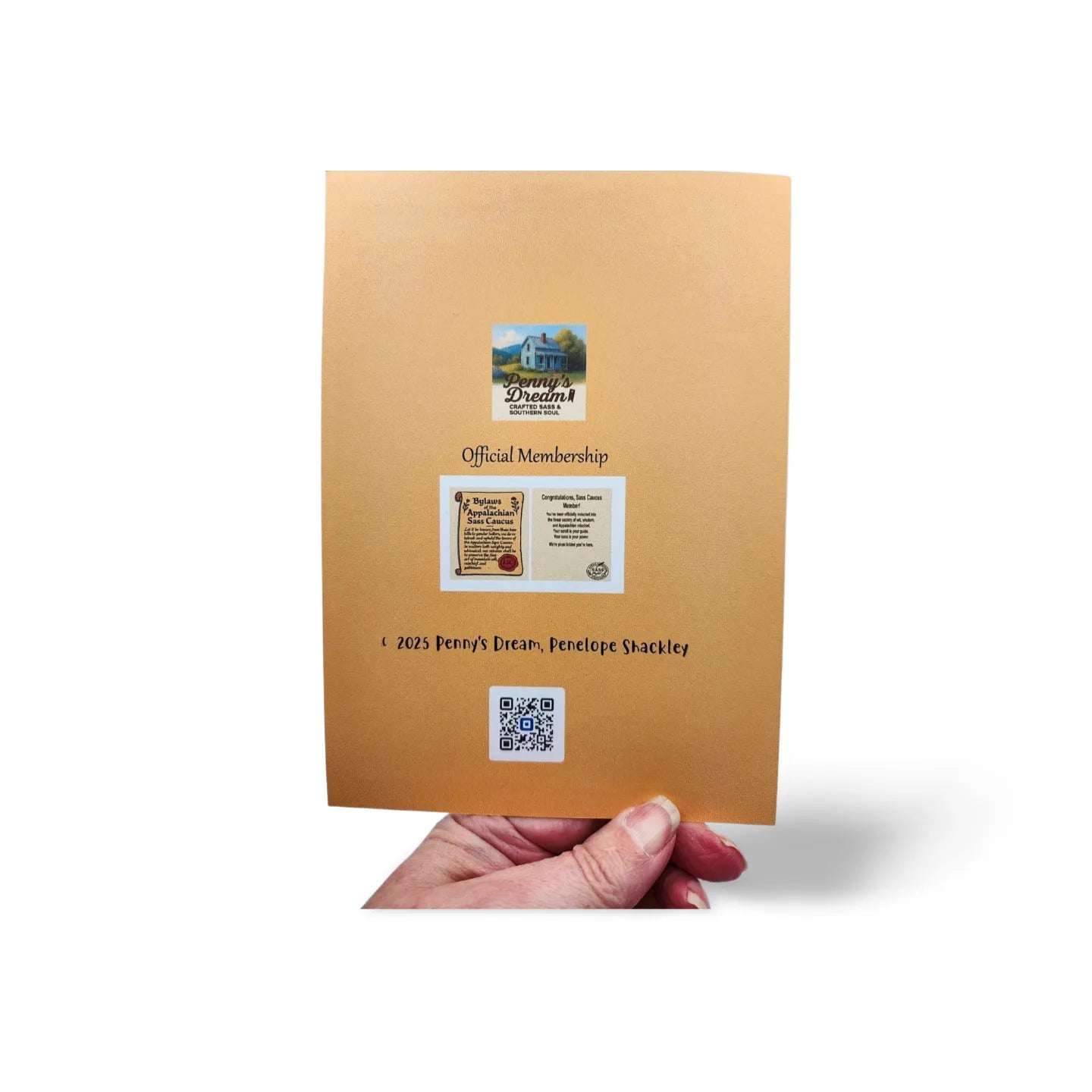 Hand holding a gold membership package with branding and text on a white background