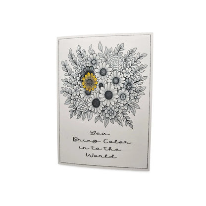 Decorative wall art with floral design and text on a white background