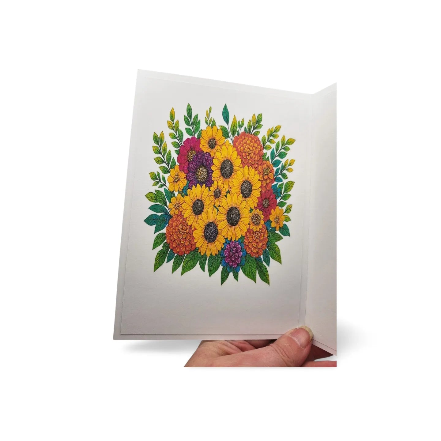 Greeting card with a colorful floral design held by a hand on a white background