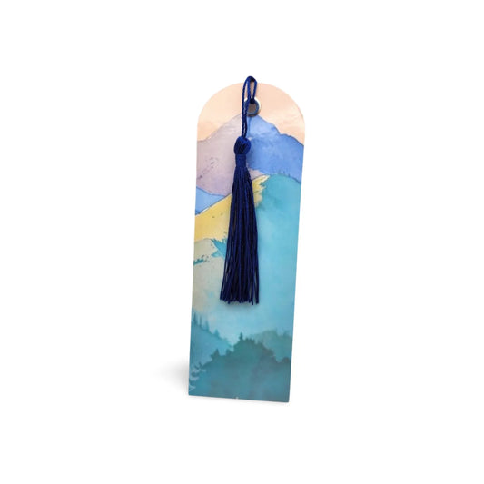 Bookmark with mountain design and tassel on a white background