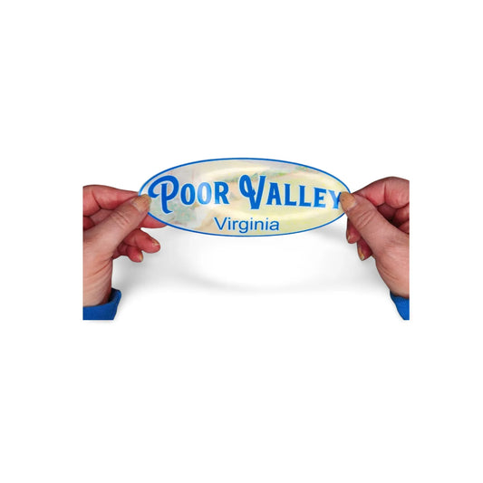 Sticker with 'Poor Valley Virginia' text held by hands on a white background