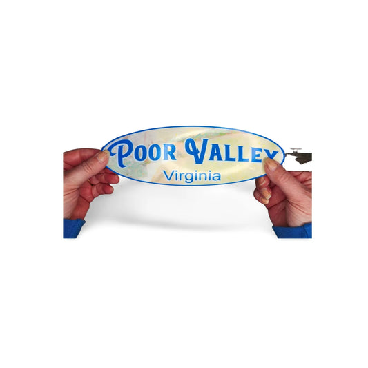 Sticker with 'Poor Valley Virginia' text held by hands on a white background