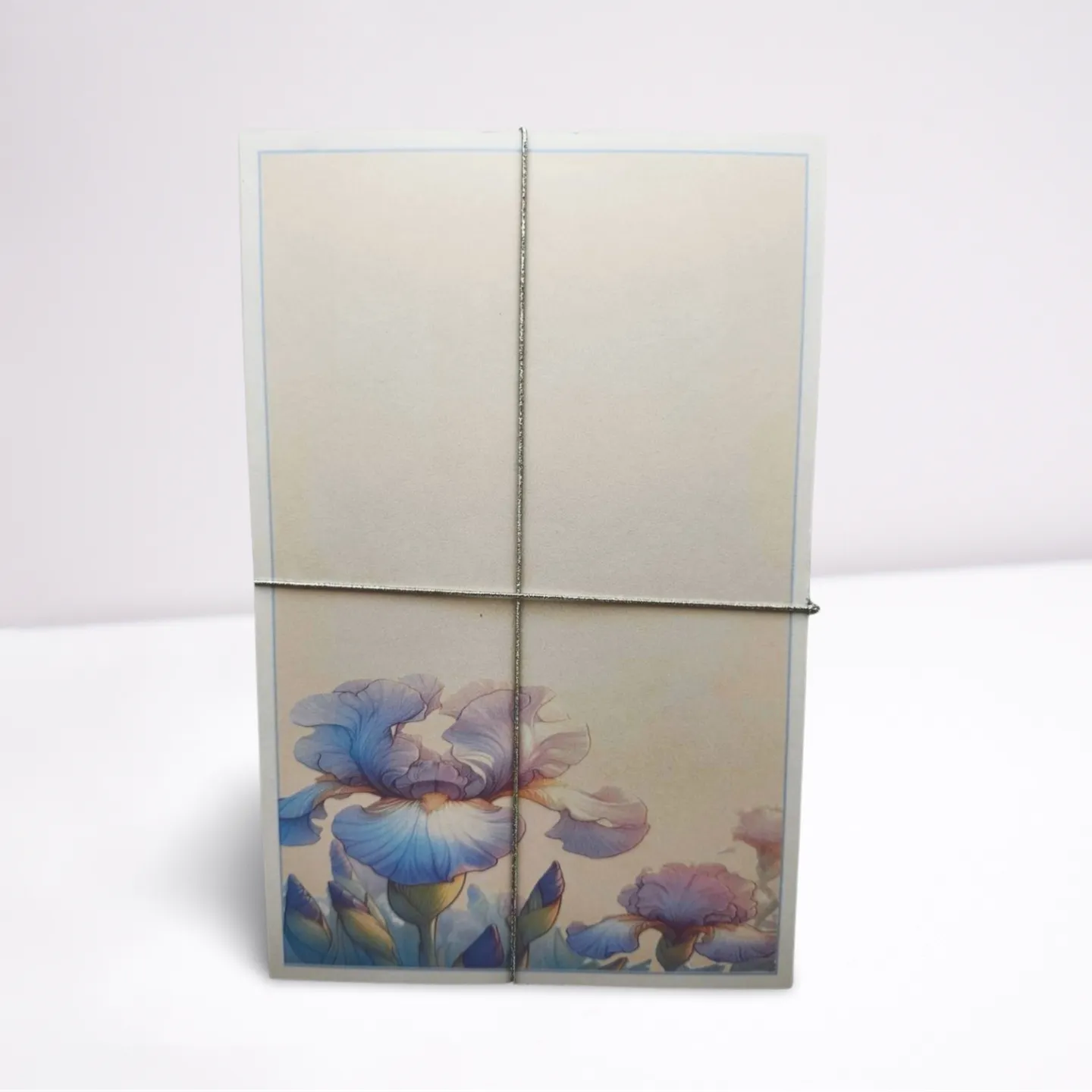 Notebook with floral design on a white background