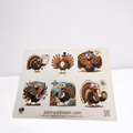 Sheet of cartoon turkeys with various expressions and activities on a white background.