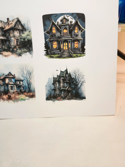 Set of three haunted house illustrations on a white surface