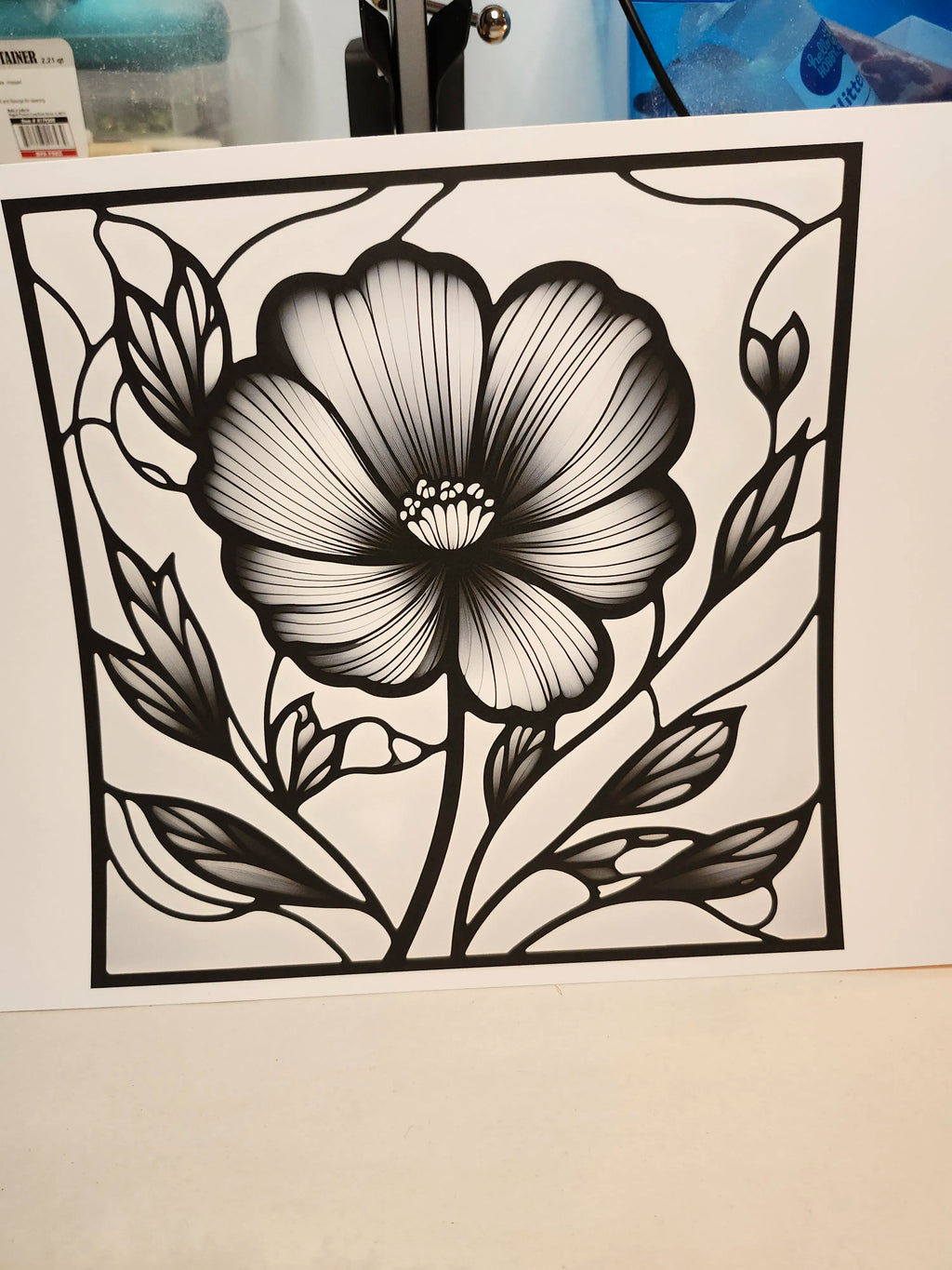 Black floral design on a white background
