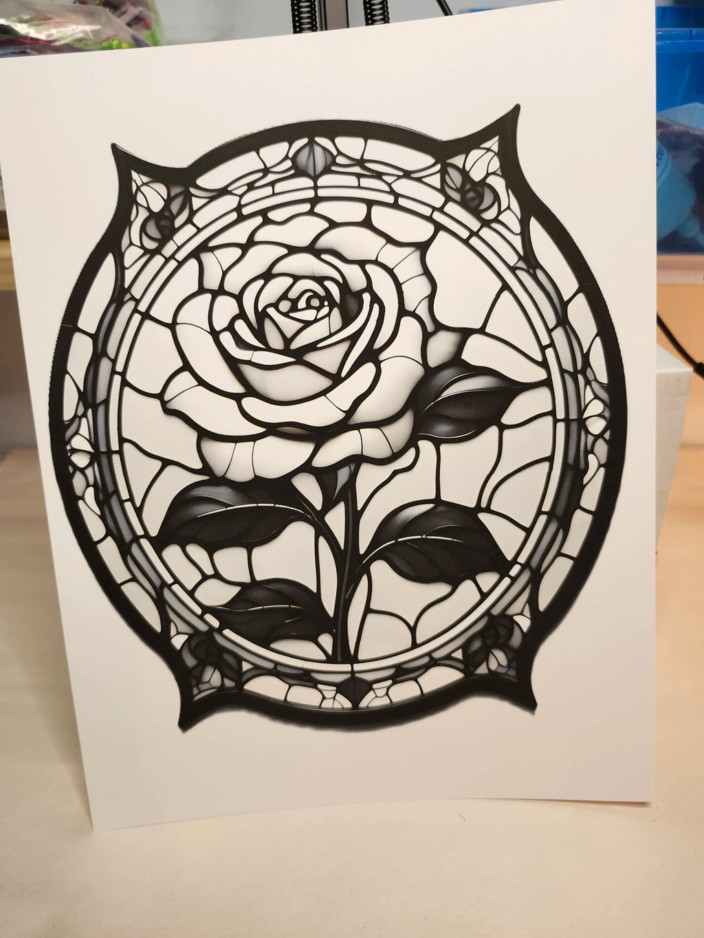 Black rose design on a white card