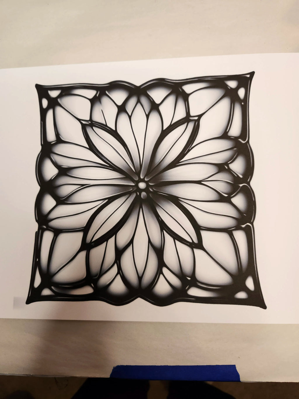 Decorative black and white floral pattern on a white background