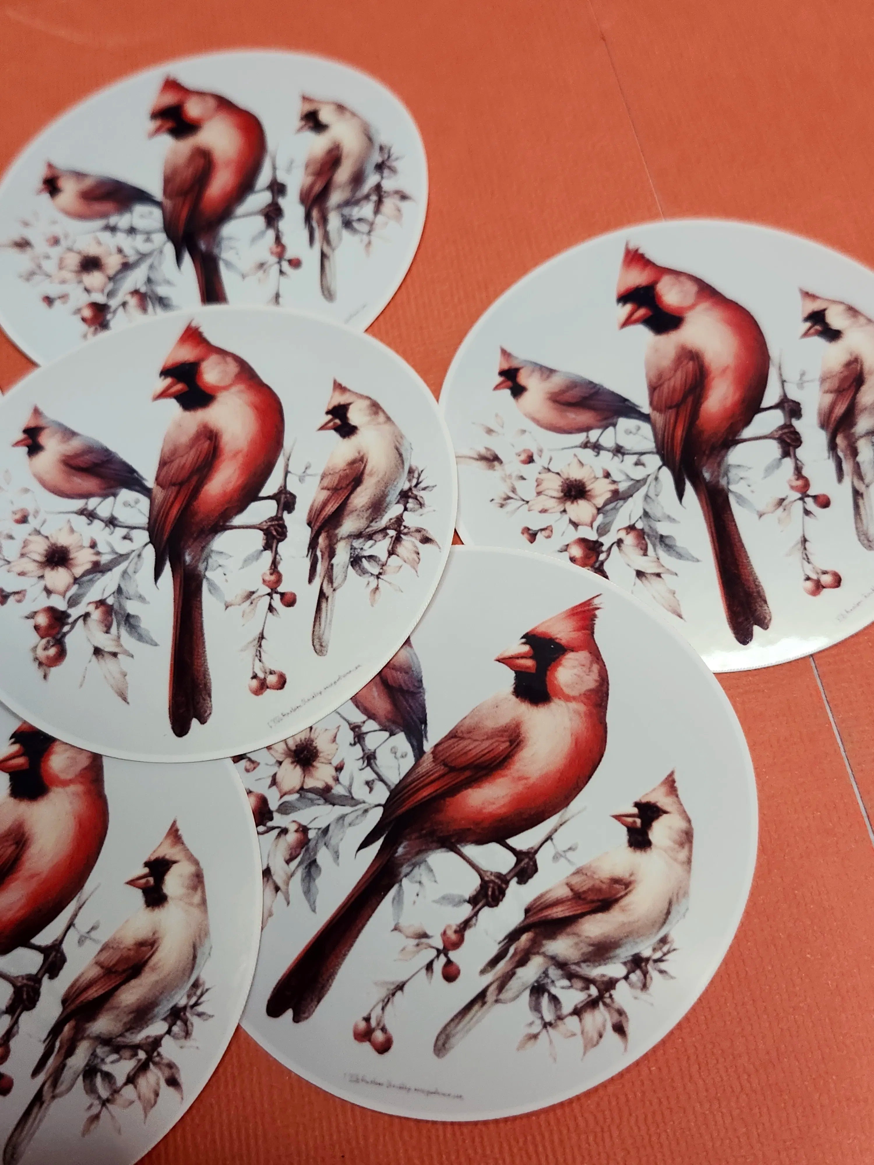 Cardinal bird stickers on a red background