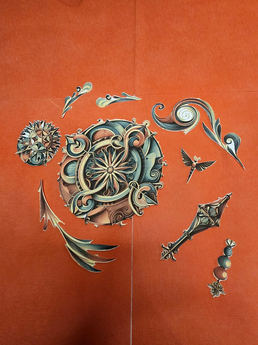 Decorative metal elements on a brown background