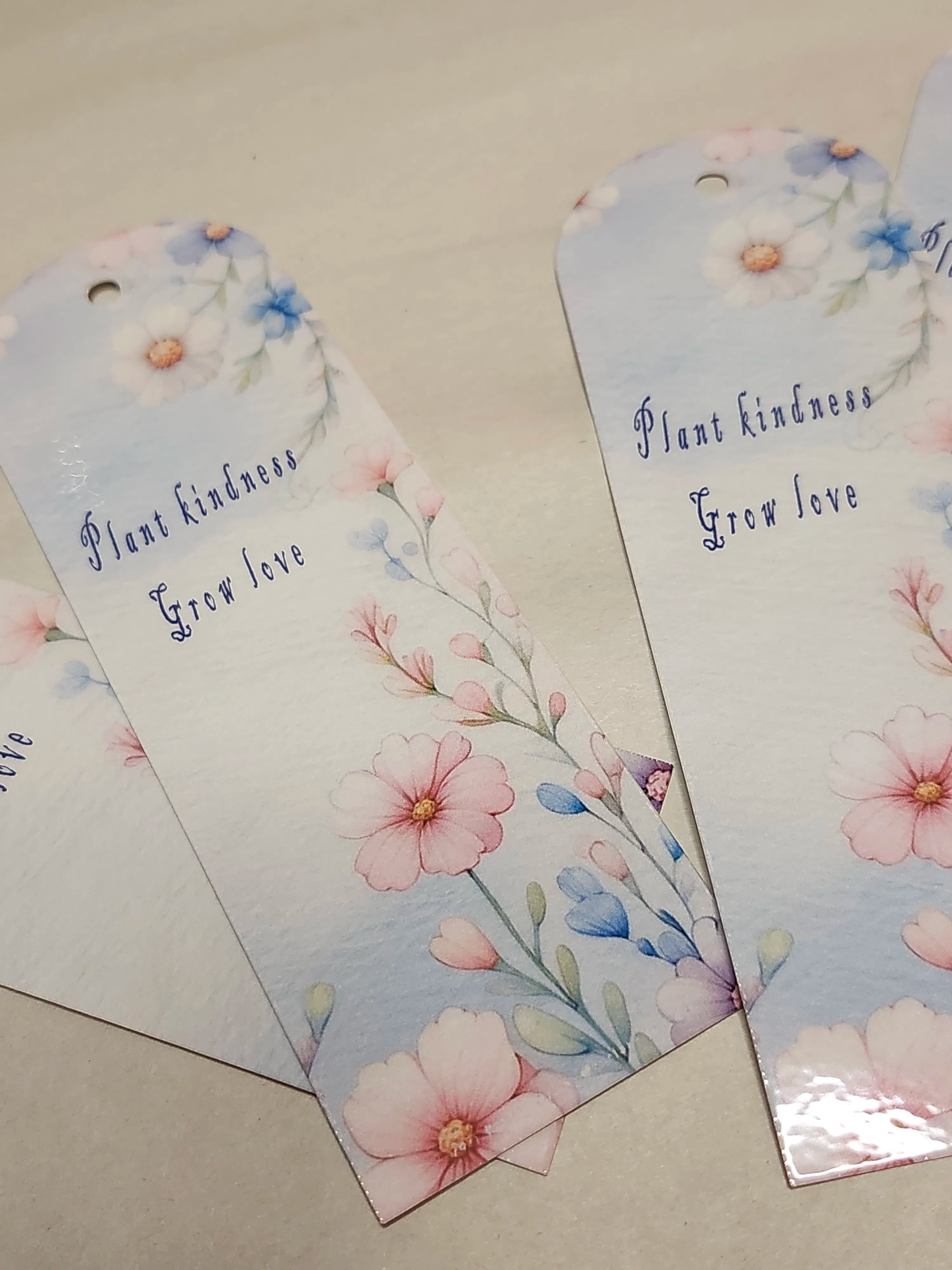 Floral bookmarks with motivational text on a light background