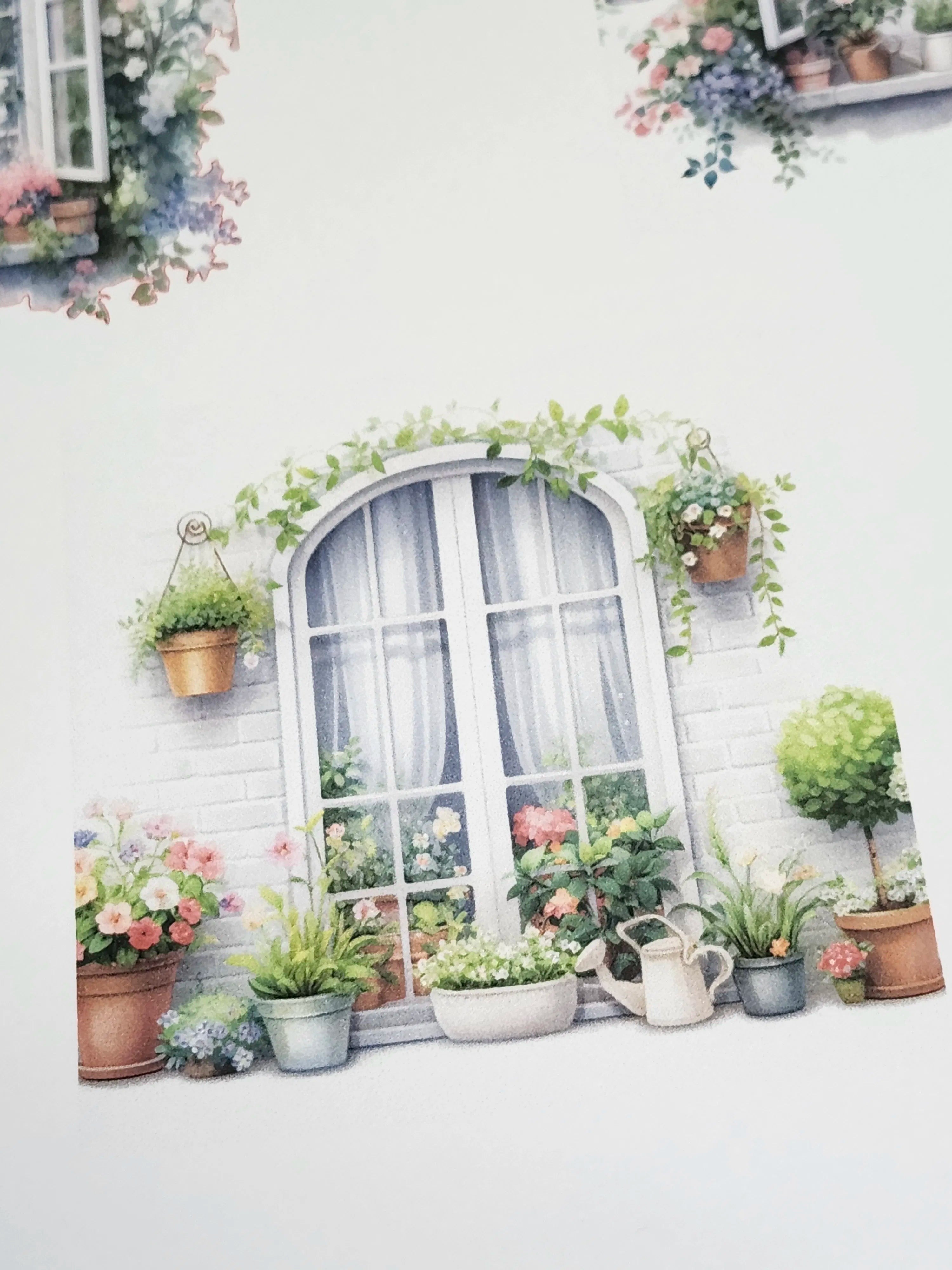Decorative window with plants and flowers on a white wall