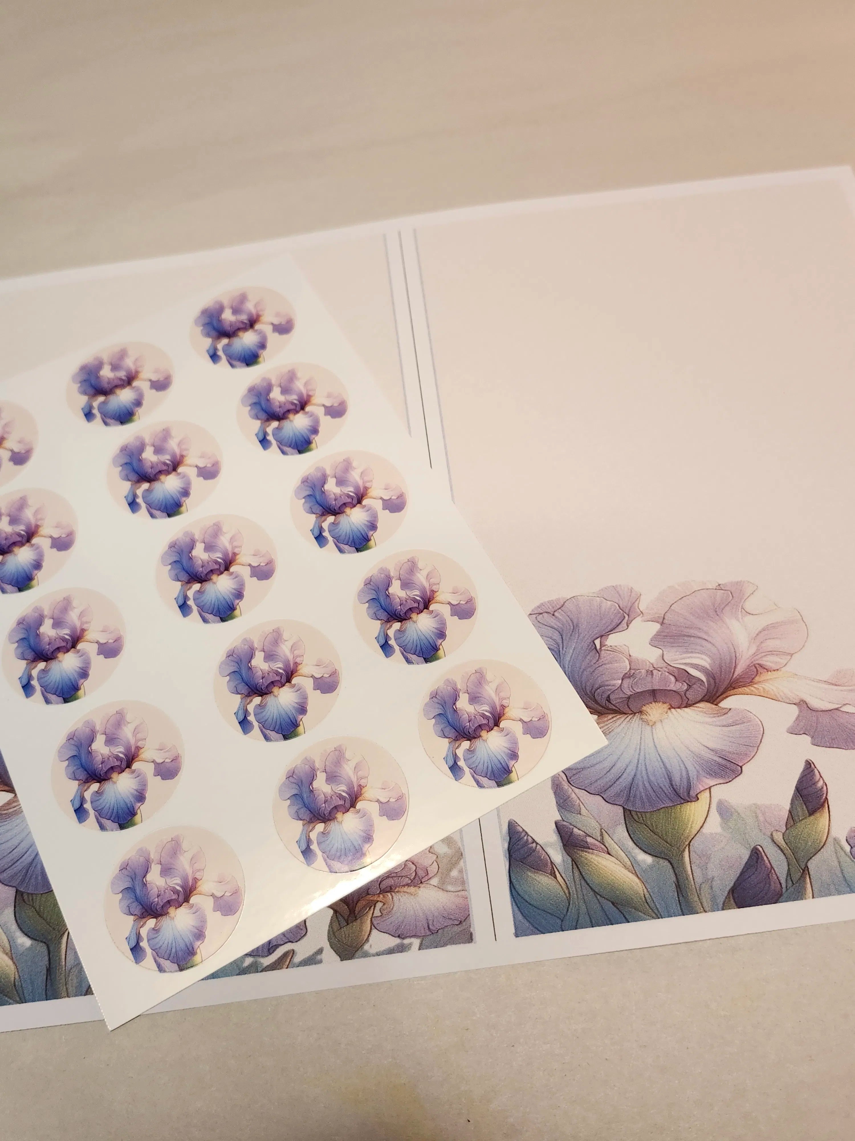Sheet of floral stickers with purple and blue flowers on a white background